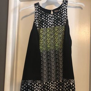 Rayon sleeveless in black, white and yellow.